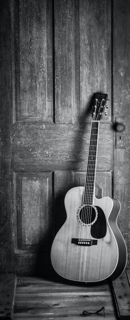 Old guitars through old doors, capture the soul